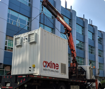 A crane lifts a shipping container